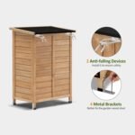 Small storage shed interior demonstrating the flexibility provided by the removable shelf for organizing different sized tools.